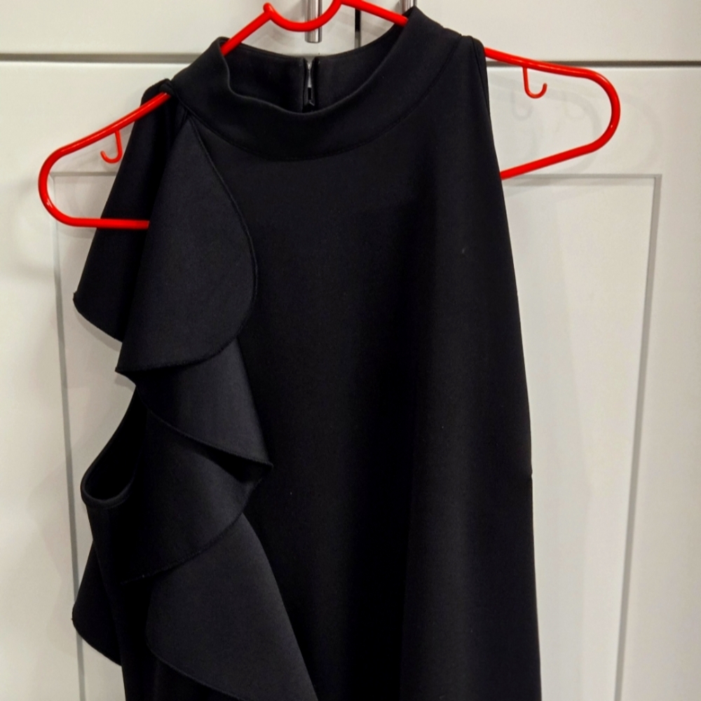 Black Peplum dress with ruffles on the side (from the shoulder down), Size 14/16